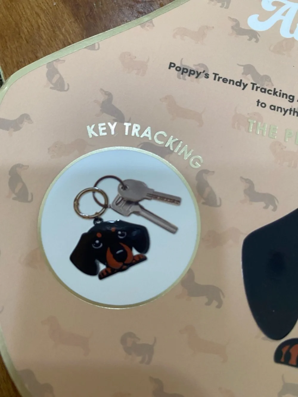 NWT. Xo Poppy, dachshund, AirTag holder.